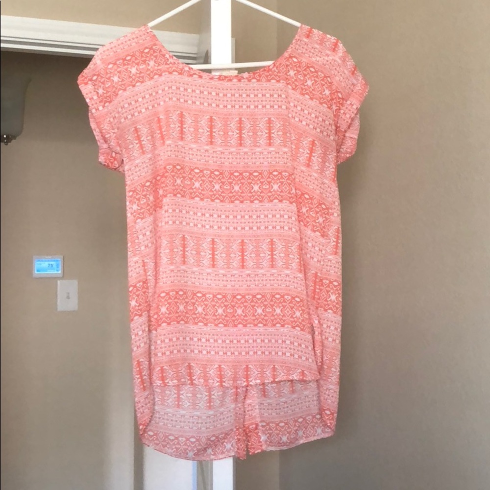 Shirt- used condition.  Buttons down the back